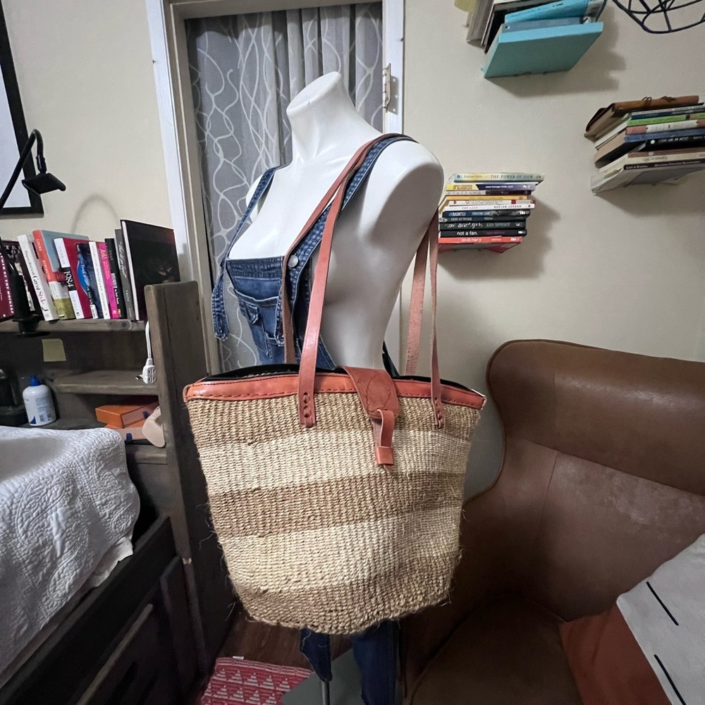 Woven basket with leather straps from Tanzania